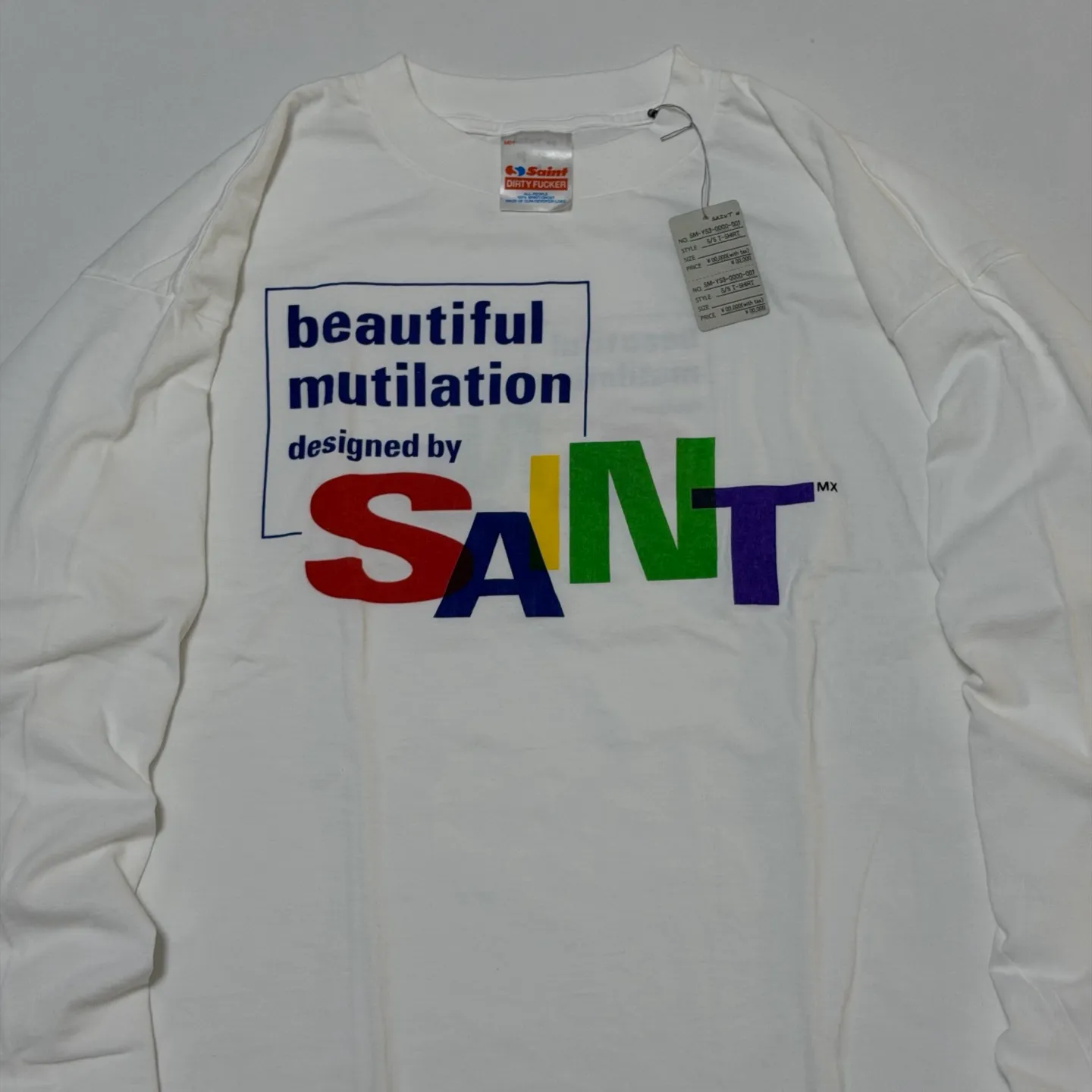 SAINT Mxxxxxx LS TEE/BEAUTIFUL SAINT/WHT Colorful SAINT slogan long-sleeved TEE White S-XL Cylindrical side seamless fabric Really made with care! Domestic printing factory OEM, original water slurry non-touch printing process, correct version, correct main mark/wash mark/little angel anti-counterfeiting mark